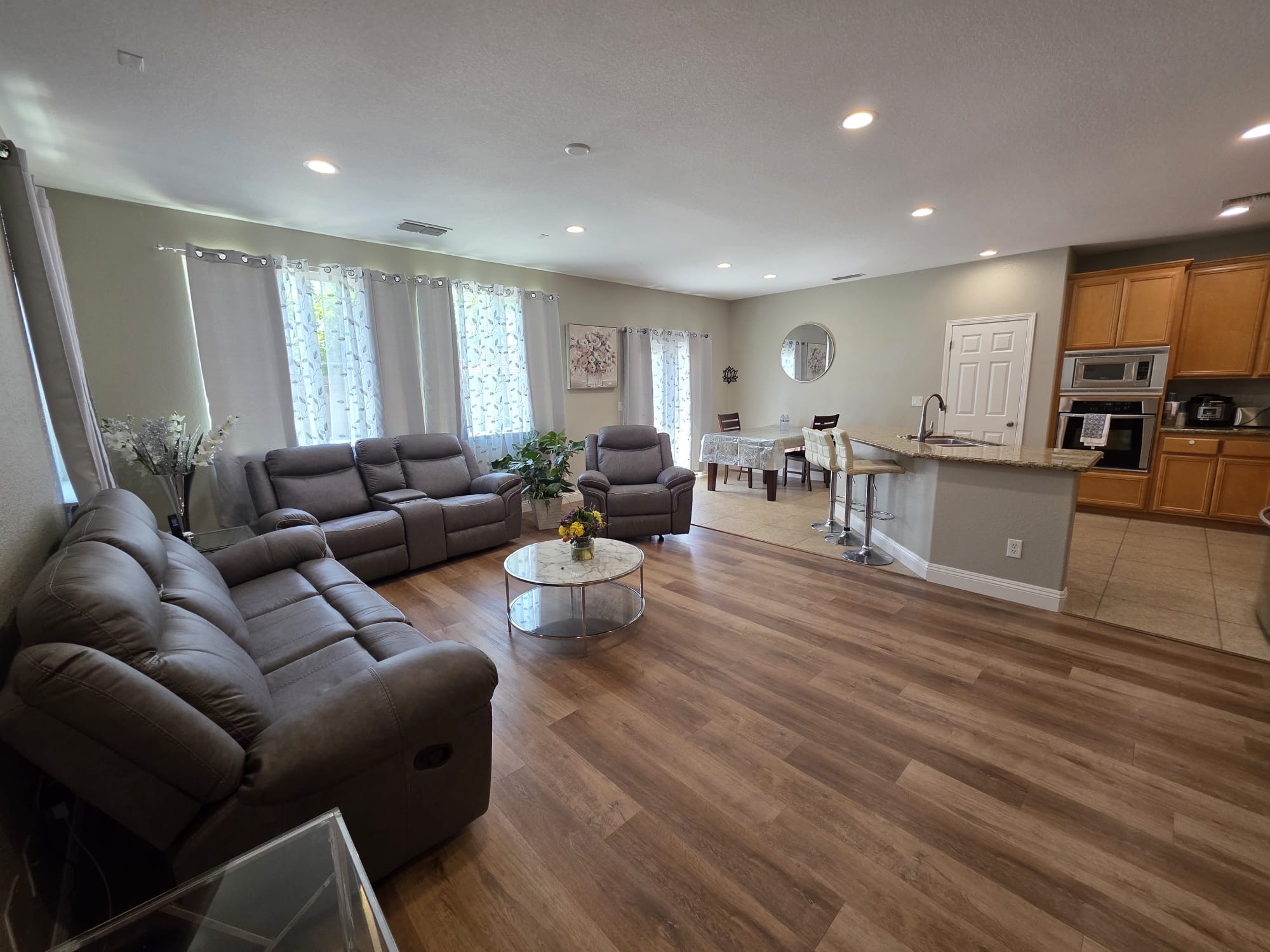 Bright and comfortable common living room at Lotus